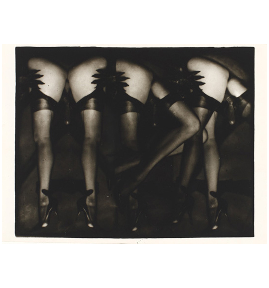 A photograph of three pairs of legs wearing stockings.